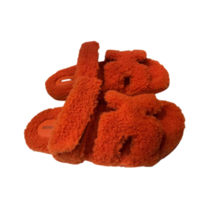 Hermès Chypre sandals in orange shearling with rubber sole