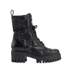Gucci combat boots in black leather with engraved GG motif