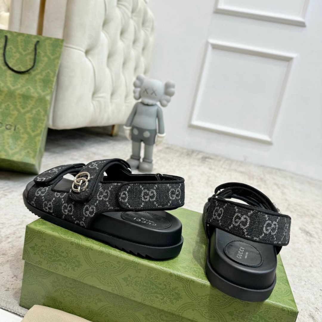 Gucci sandals in GG denim canvas and black rubber sole view 2
