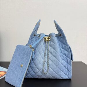 Chanel quilted denim drawstring bag with matching clutch